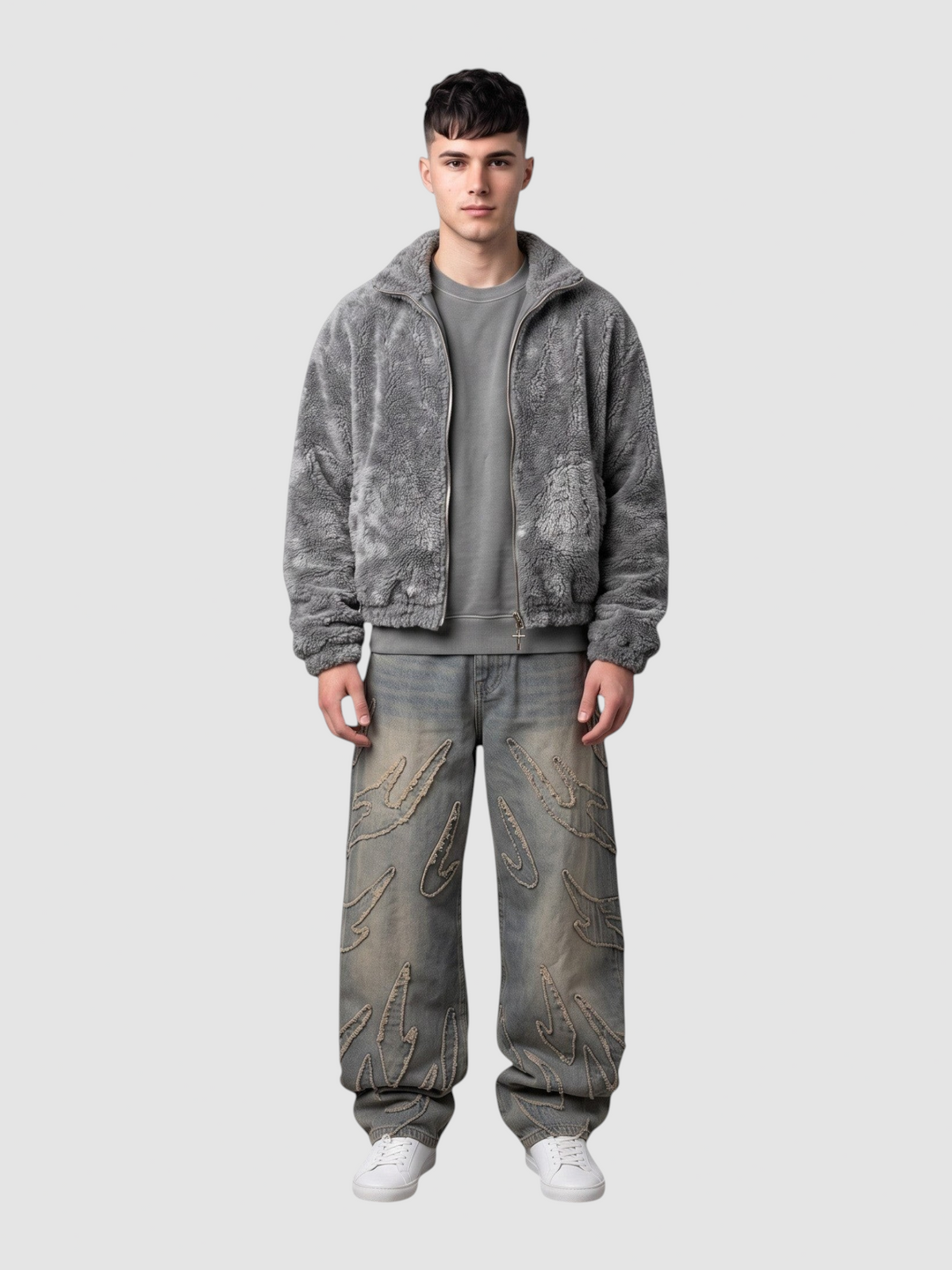 Y2K Avenue baggy grey denim jeans featuring raw-edge flame appliqués, worn by a model with a grey fleece jacket.