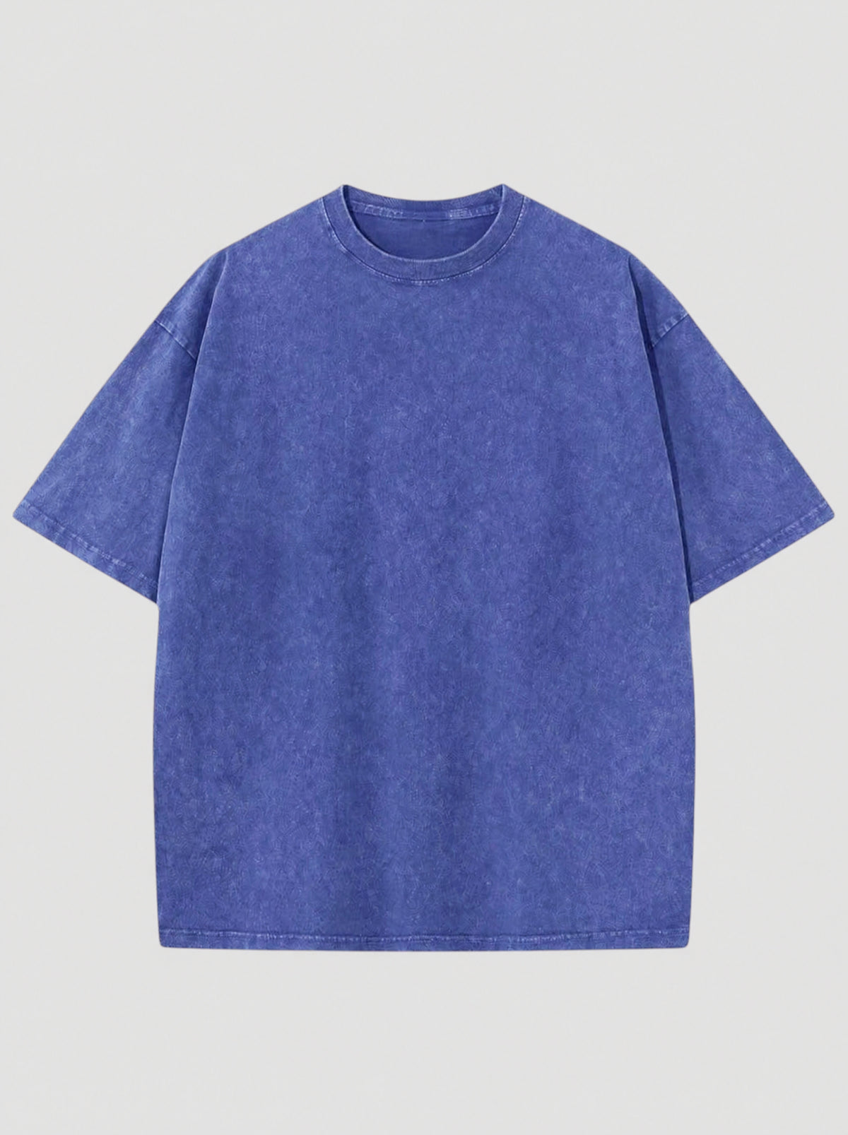 T-shirt bleu délavé vintage en coton, coupe décontractée, col rond et manches courtes.