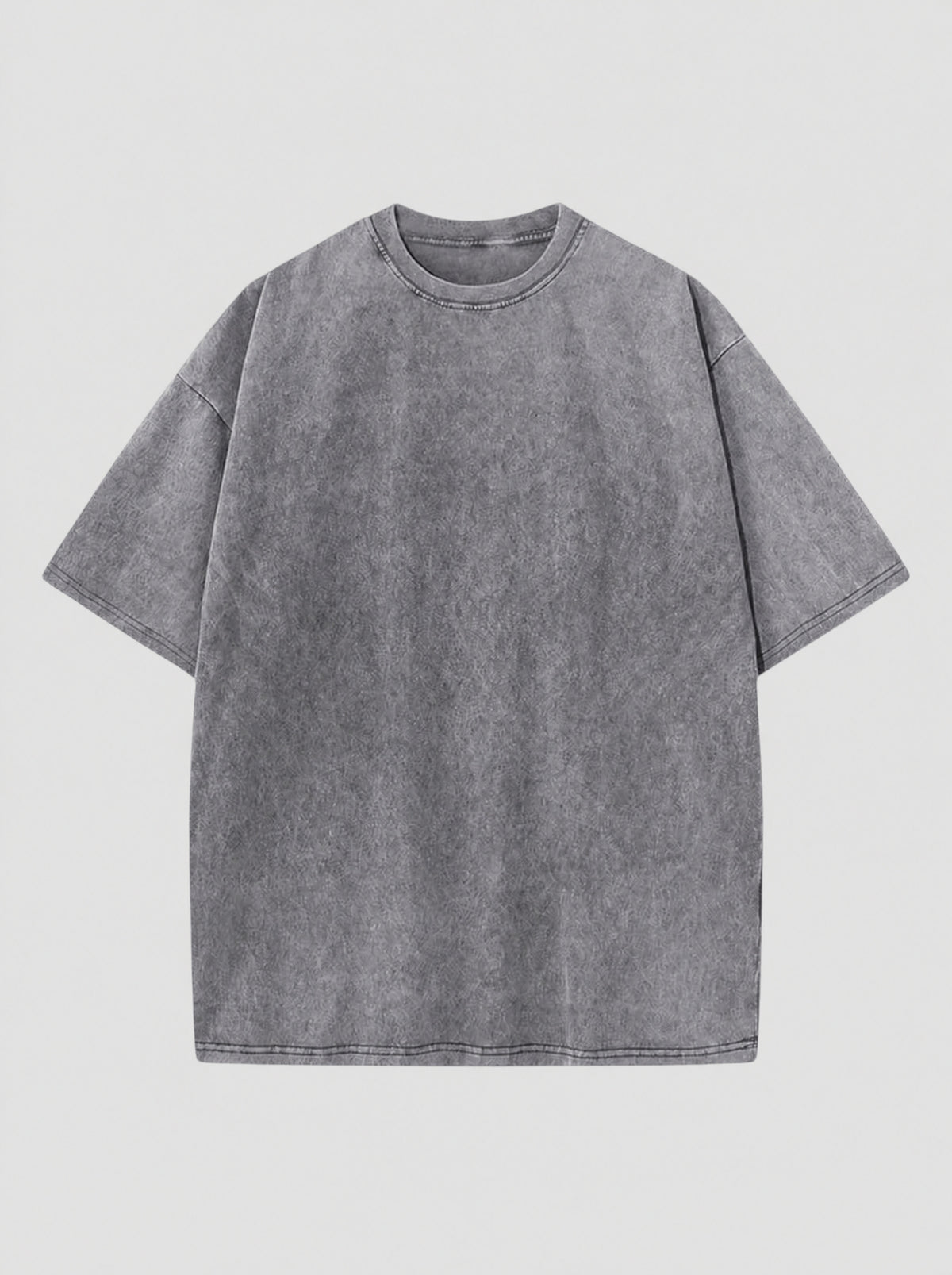 T-shirt gris délavé vintage en coton, coupe décontractée, col rond et manches courtes.
