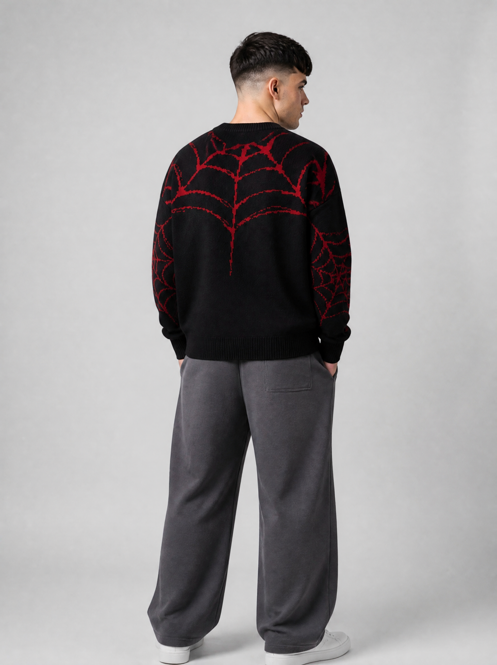 Autre vue | Dos du pull noir en maille avec une toile d’araignée rouge sur le haut du dos et les manches | Variante : Noir