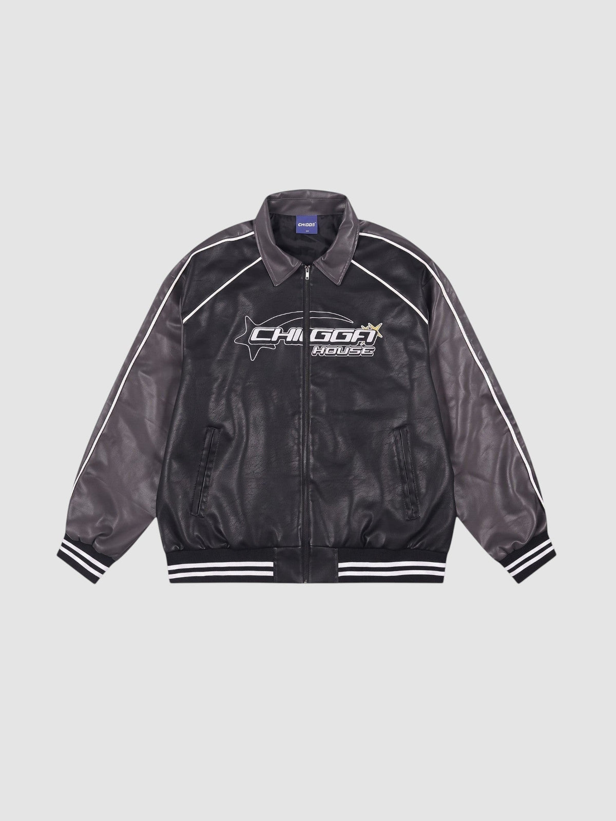 Blouson moto oversize noir et gris anthracite avec liseré blanc, graphisme imprimé et poignets côtelés.