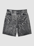 Y2K Avenue acid wash black denim jorts featuring a distressed thorny star appliqué with raw frayed edges.
