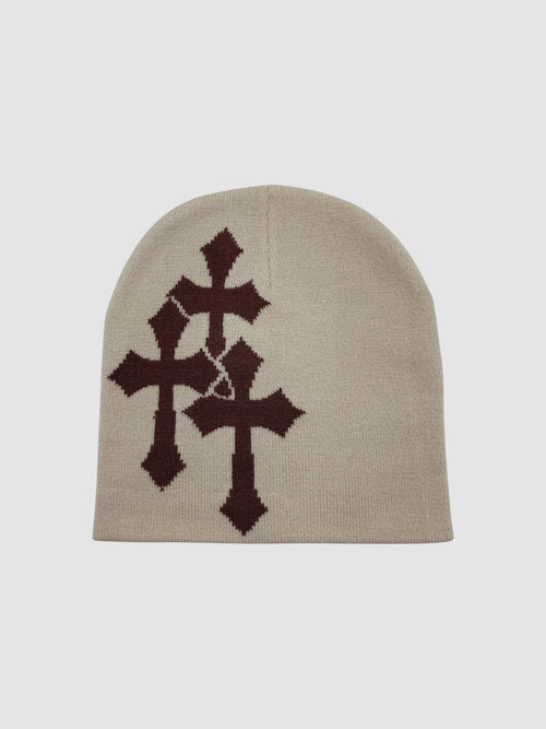 Y2K Avenue beige knit beanie featuring a dark brown jacquard triple cross pattern with a subtle cracked design.