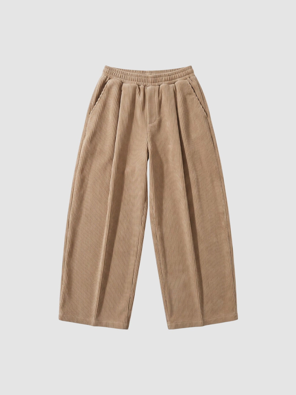 Y2K Avenue beige wide-leg corduroy trousers with an elasticated waist and deep side pockets in a relaxed Y2K style.