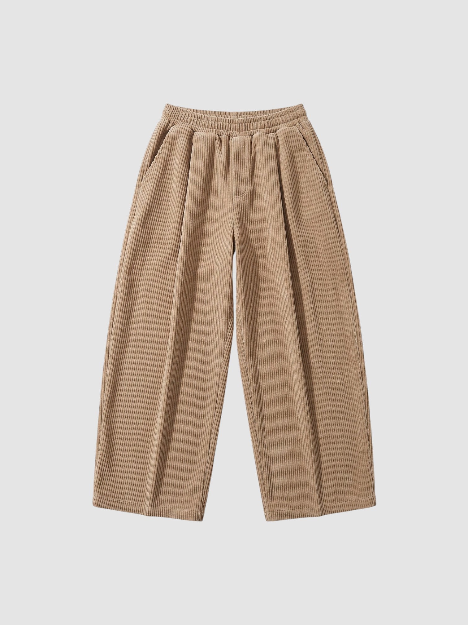Y2K Avenue beige wide-leg corduroy trousers with an elasticated waist and deep side pockets in a relaxed Y2K style.