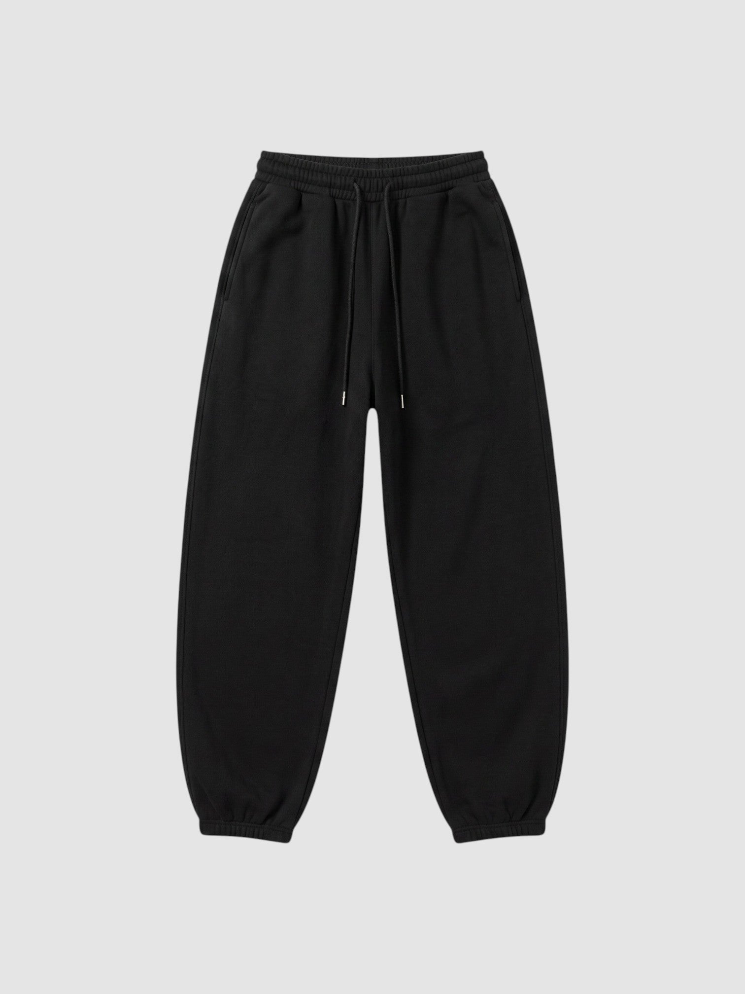 Y2K Avenue black barrel leg sweatpants with a high elastic waist, drawstring, and deep side pockets.