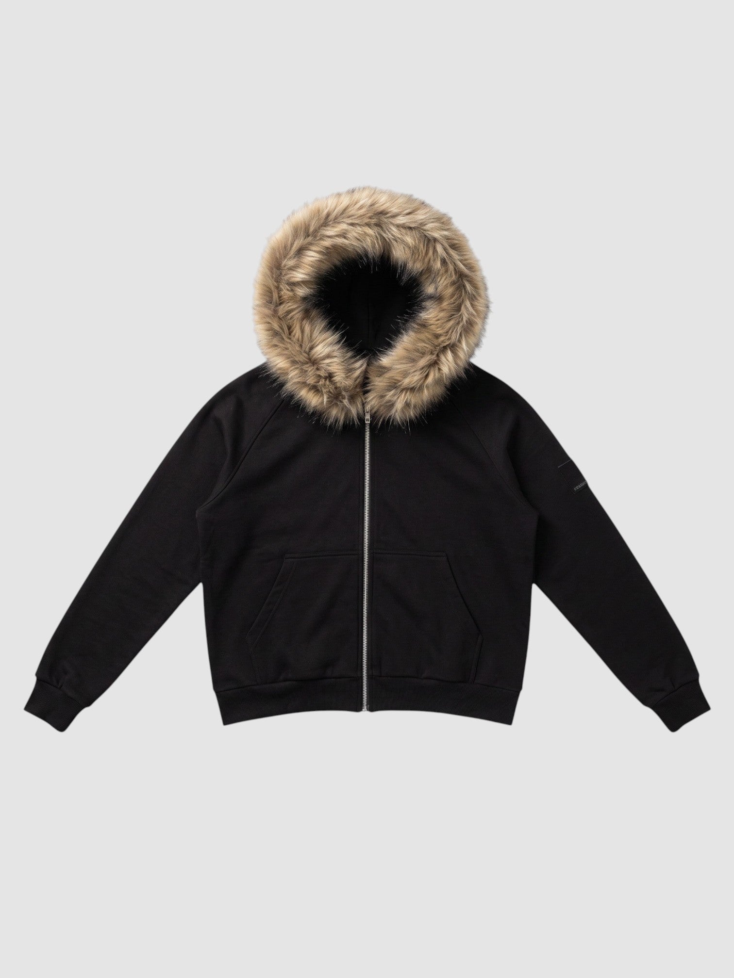 Y2K Avenue black zip-up hoodie featuring a thick beige faux fur hood trim, ribbed cuffs, and a cropped fit.