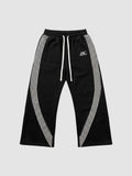 Y2K Avenue black fleece baggy joggers with white side stripes and embroidered logo on the left thigh