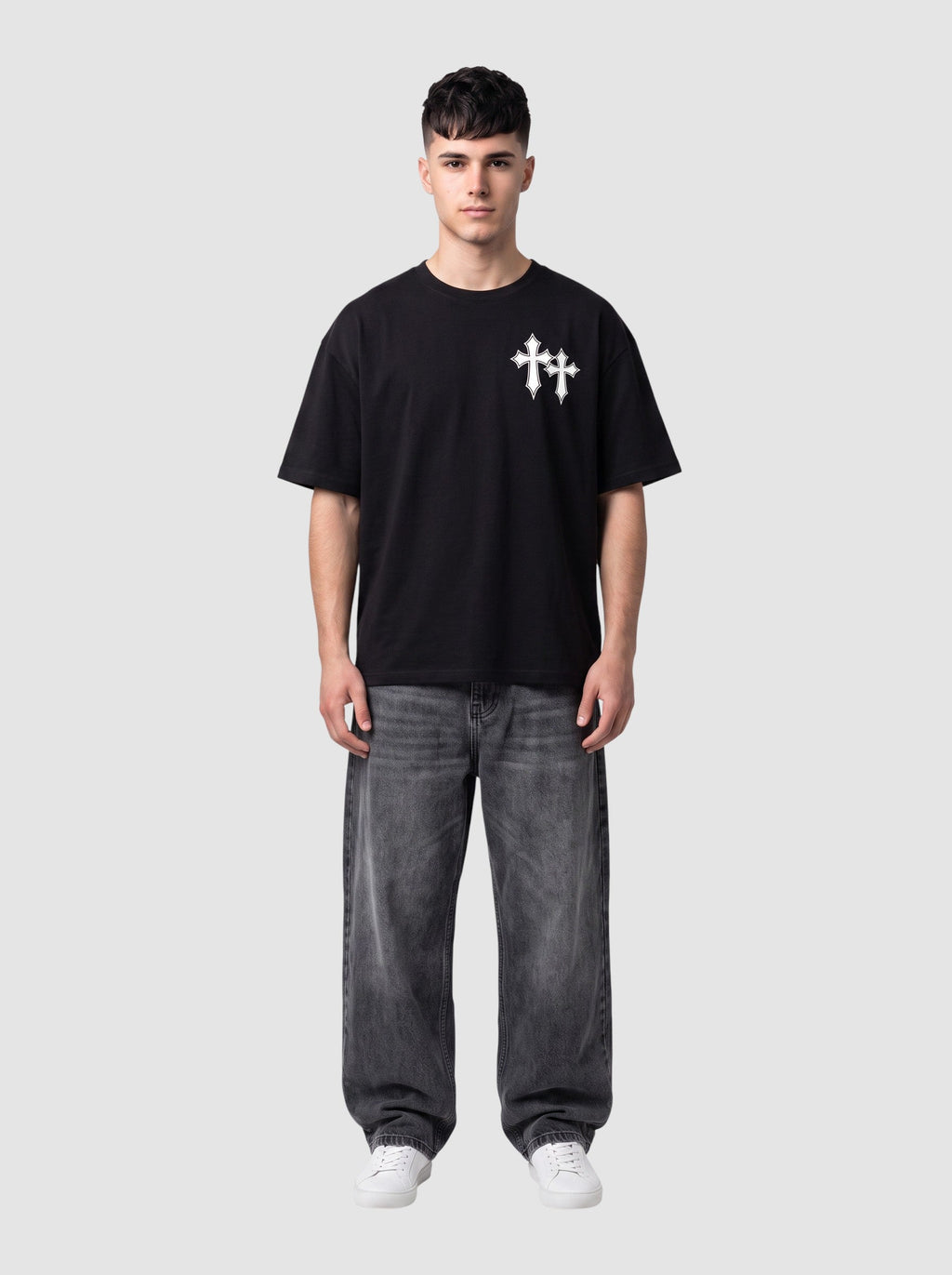 Y2K Avenue black oversized cotton t-shirt with white gothic cross print on chest worn by a male model