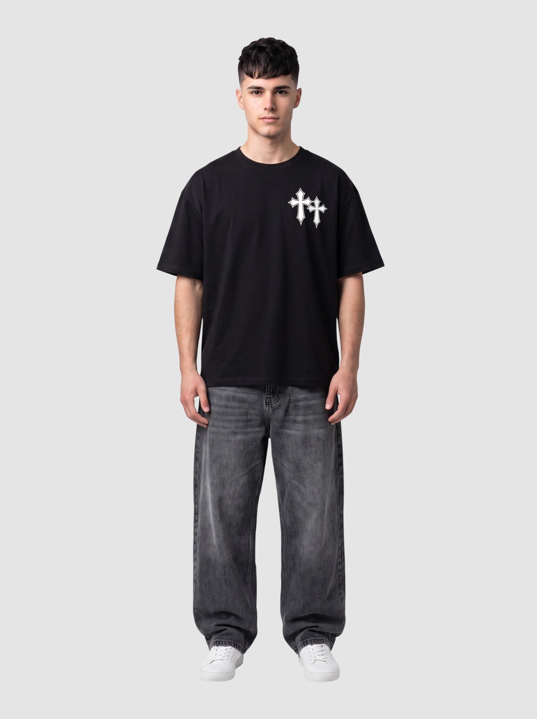Y2K Avenue black oversized cotton t-shirt with white gothic cross print on chest worn by a male model