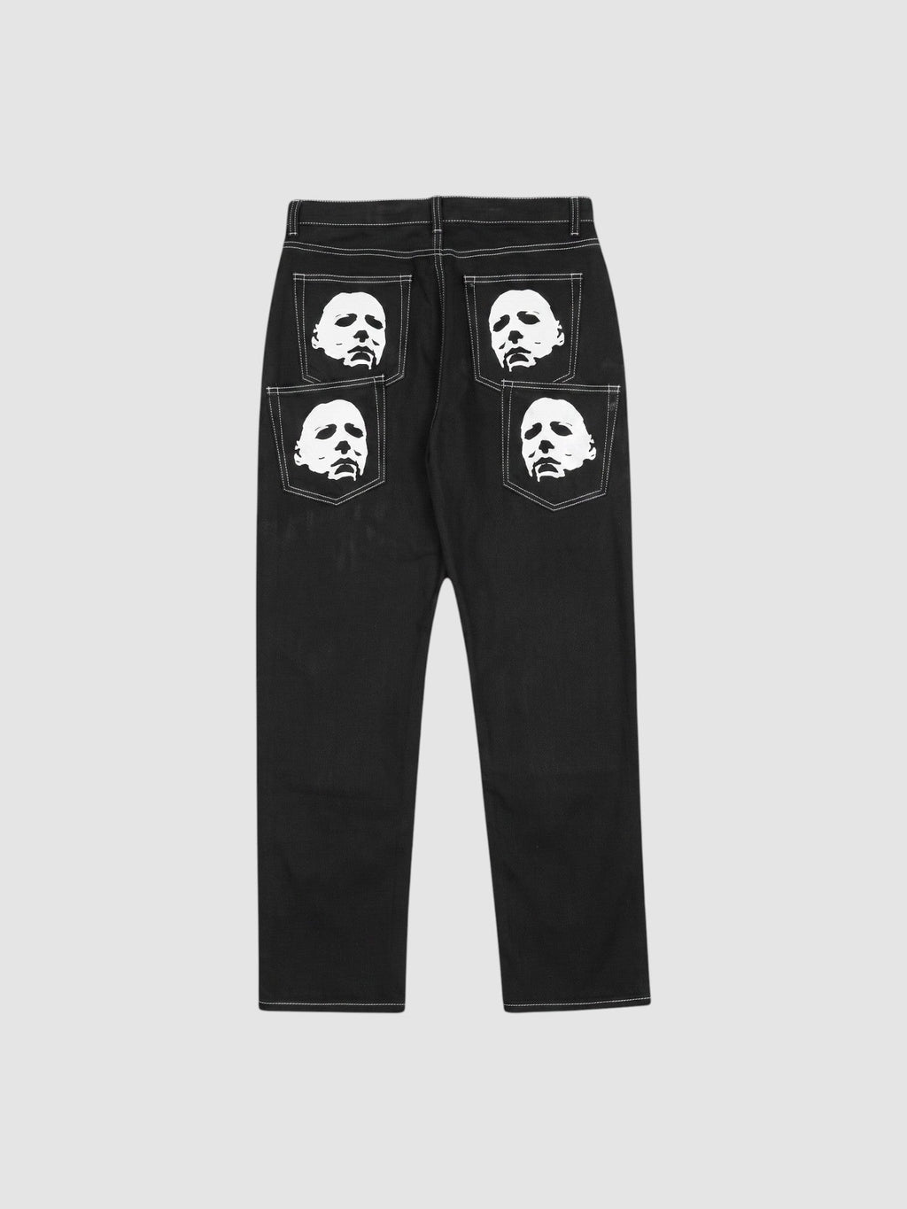 Y2K Avenue black straight-leg denim jeans featuring white mask face prints on the back pockets and contrast stitching.