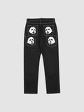Y2K Avenue black straight-leg denim jeans featuring white mask face prints on the back pockets and contrast stitching.