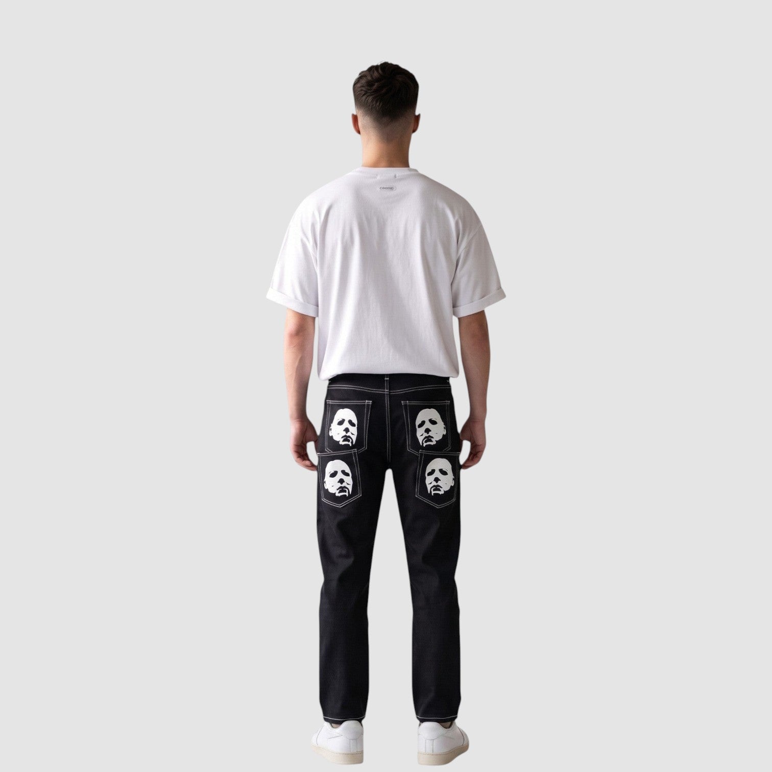 Y2K Avenue black straight-leg denim jeans with white mask prints on back pockets and contrast white stitching