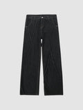 Y2K Avenue black wide-leg denim jeans featuring diagonal raw-edge seams and a button fly closure.