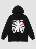 Y2K Avenue black zip-up hoodie featuring a white skeleton rib cage print with a red heart detail on the chest.