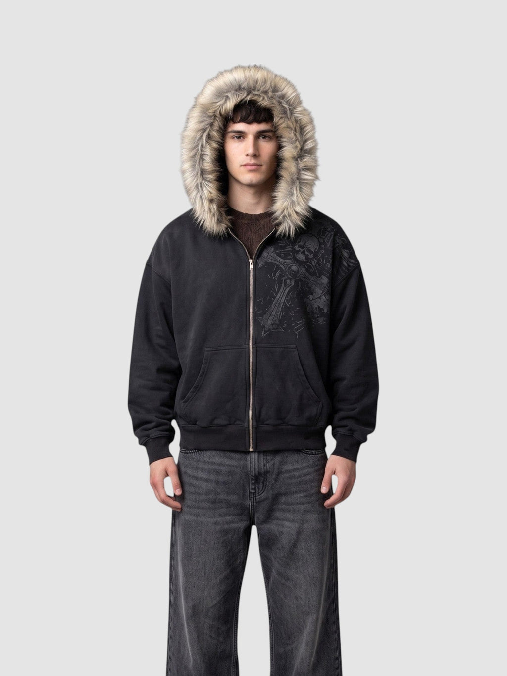 Y2K Avenue black washed grunge zip-up hoodie with faux fur hood and silver graphic print worn by a male model