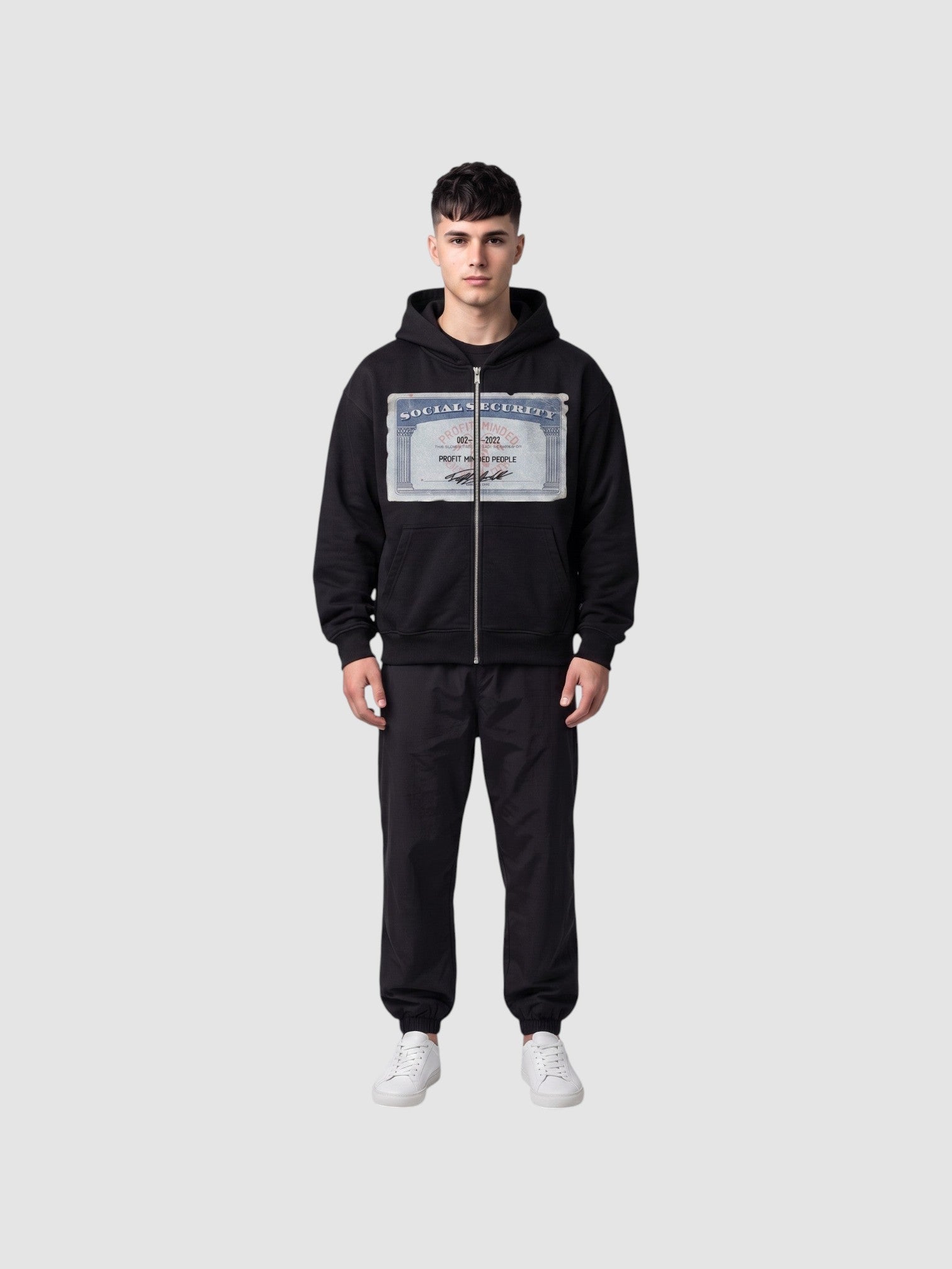 Y2K Avenue black zip-up hoodie featuring a Social Security card graphic print on the chest, worn by a male model.