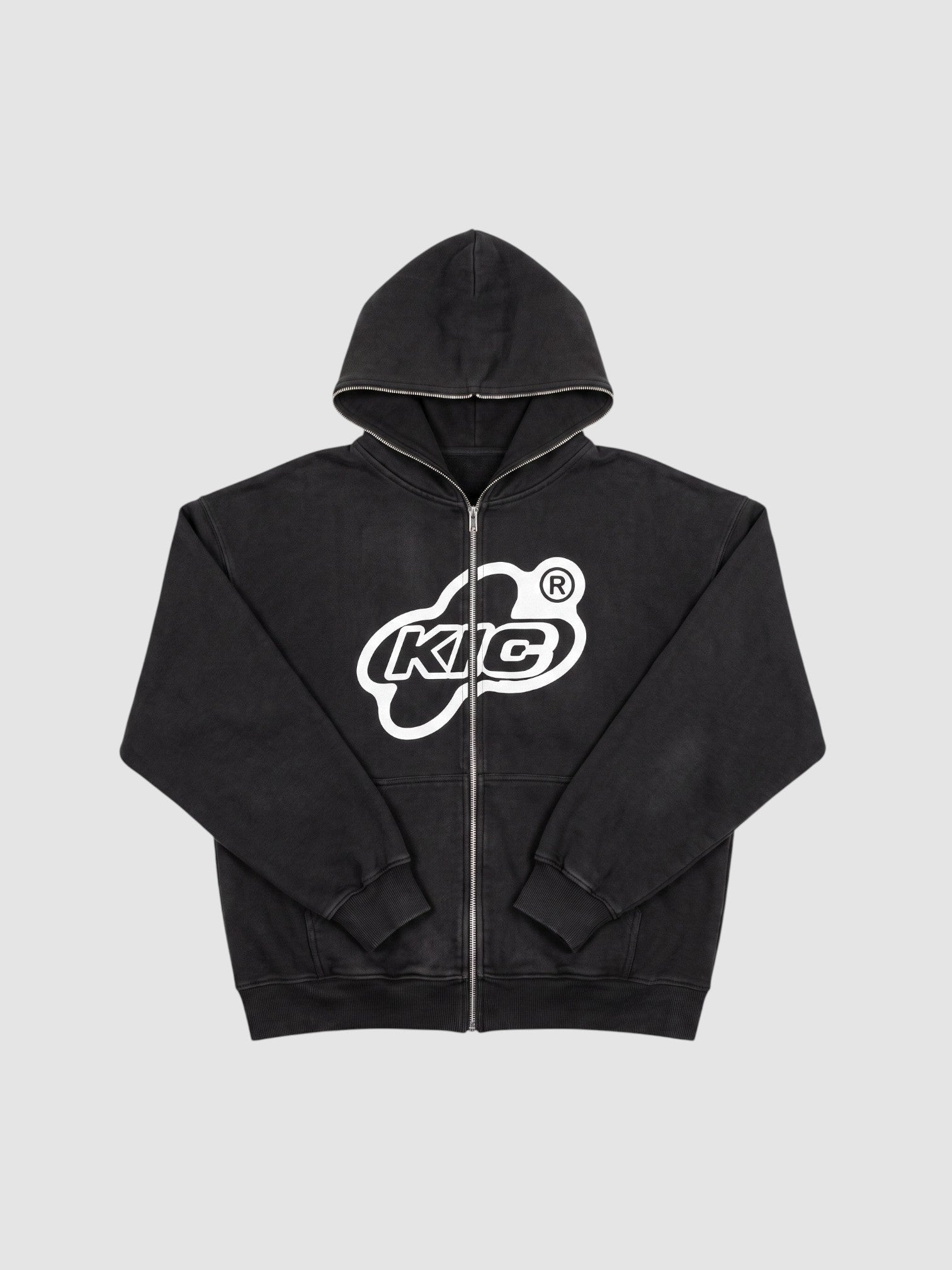 Y2K Avenue black zip-up hoodie with white bubble logo, contrast piping on hood and zipper, and oversized fit.