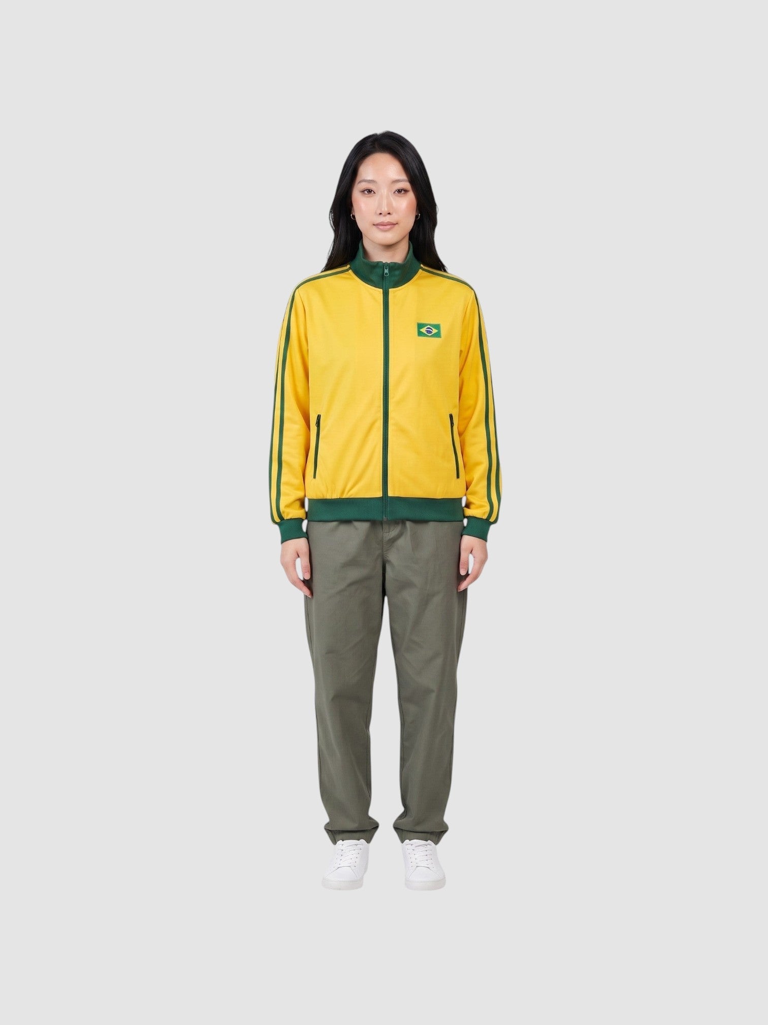 Y2K Avenue yellow and green Brazil track jacket with a high collar, zip closure, and embroidered flag patch.