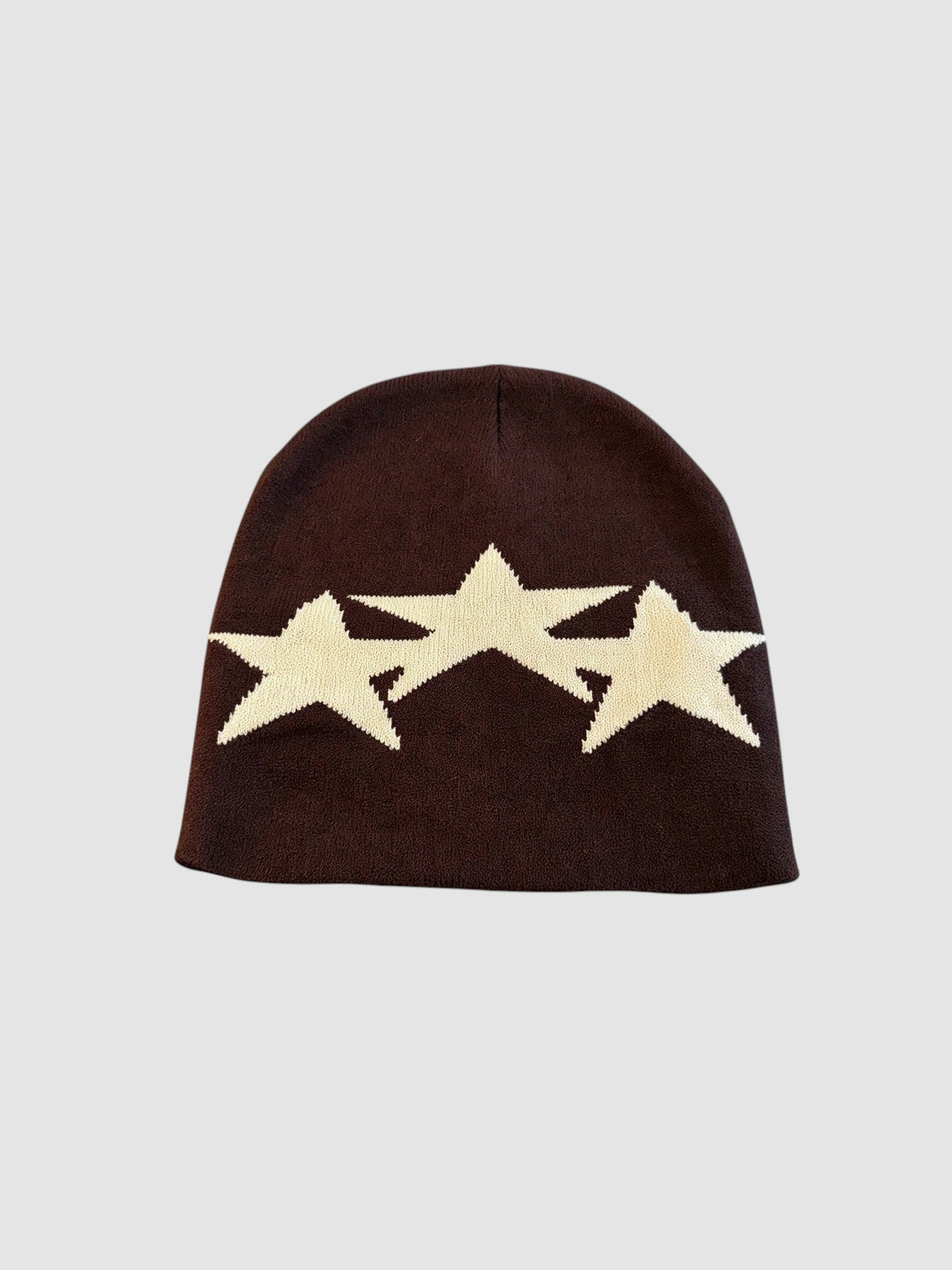 Y2K Avenue Bonnet Étoile beanie in dark brown acrylic knit featuring three overlapping cream-colored star motifs.