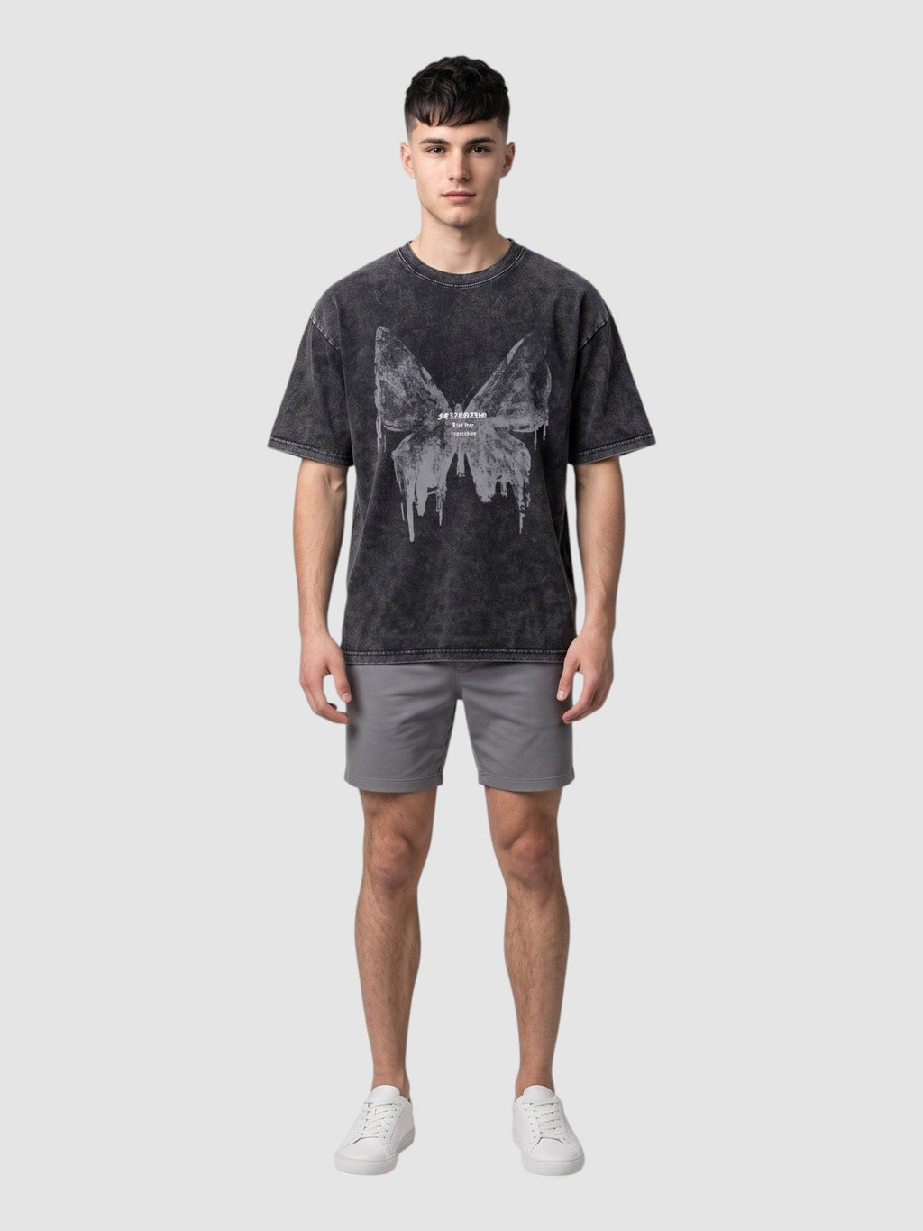 Y2K AVENUE charcoal grey acid-wash t-shirt with a butterfly graphic, worn by a male model with grey shorts