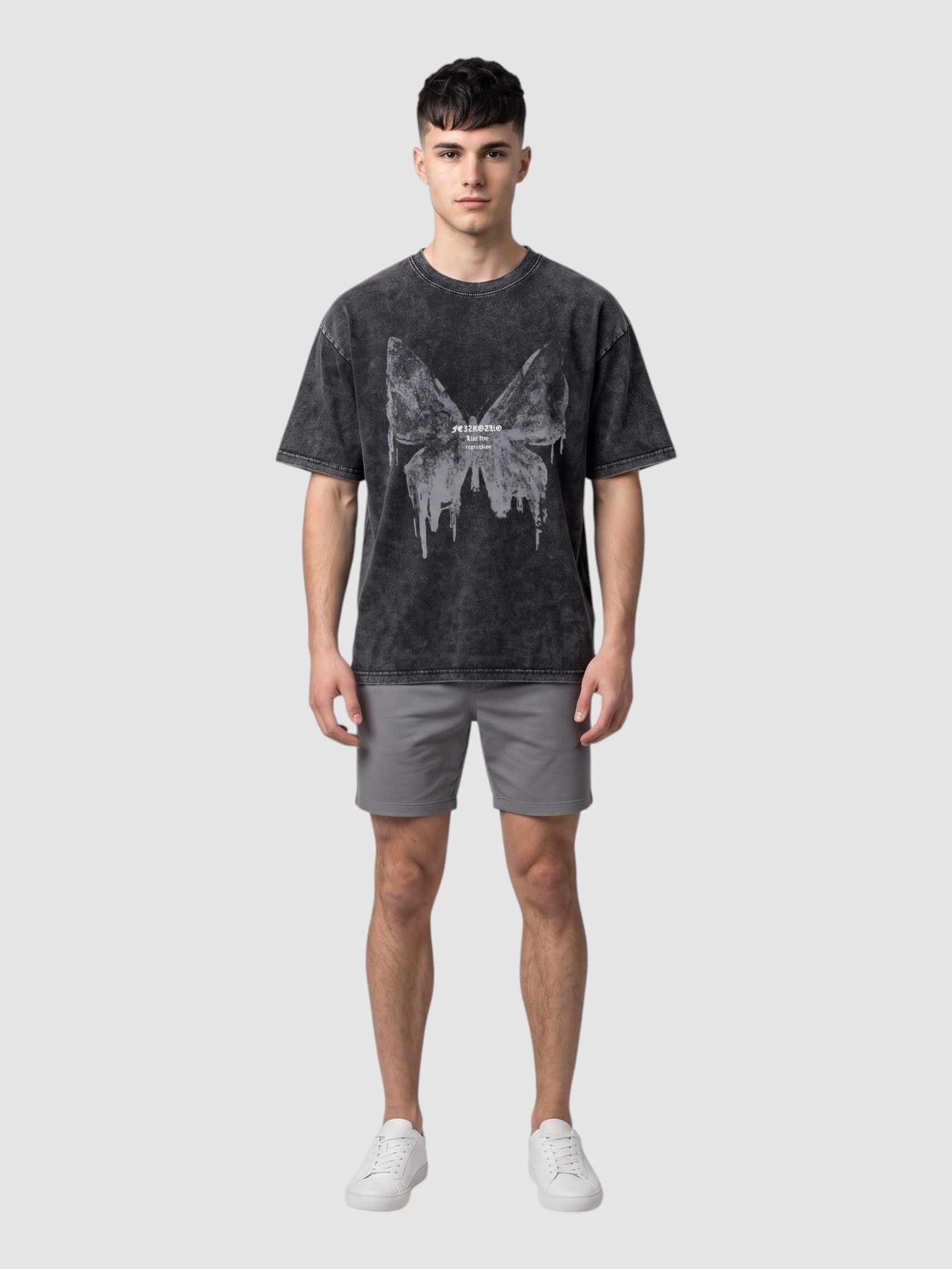 Y2K AVENUE charcoal grey acid-wash t-shirt with a butterfly graphic, worn by a male model with grey shorts