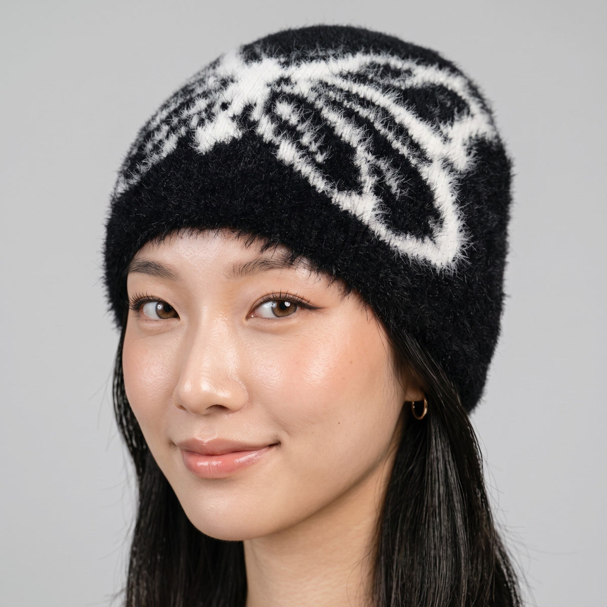 Y2K AVENUE black and white butterfly pattern knit beanie made from soft cotton and fur for a cozy casual look