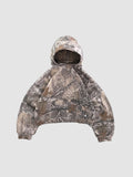 Y2K Avenue cropped boxy hoodie in a brown and grey forest camouflage print with a wide fit and ribbed cuffs