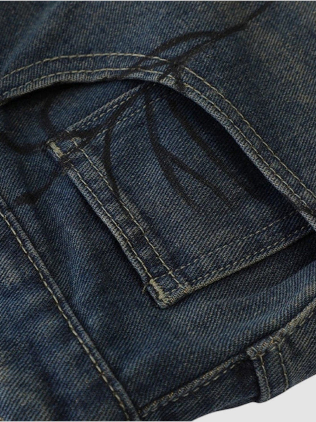 Y2K Avenue Y2K spider print denim jorts in distressed blue cotton with detailed black spider graphic on pocket
