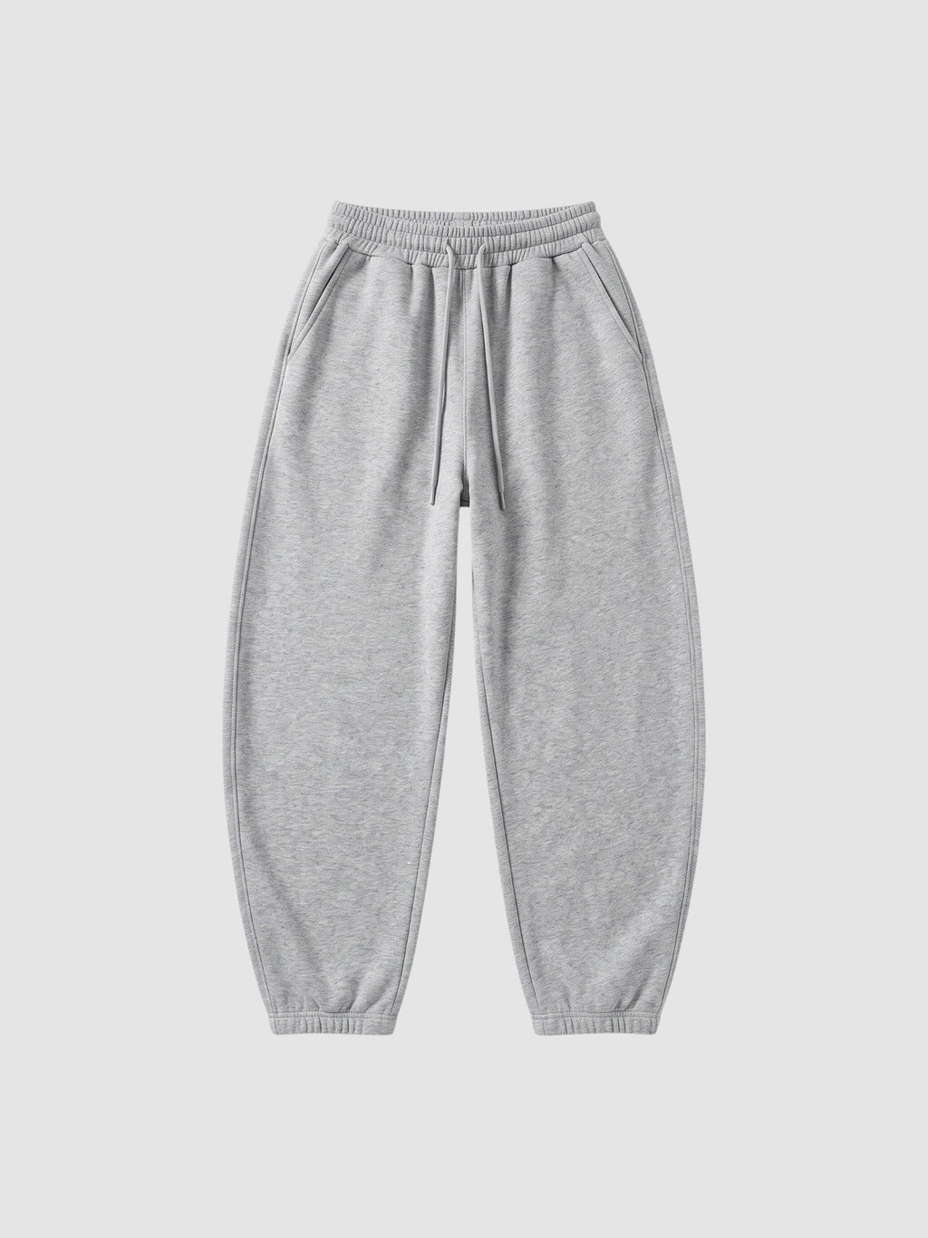 Y2K Avenue grey barrel leg sweatpants with a high elastic waist, drawstring, and deep side pockets.