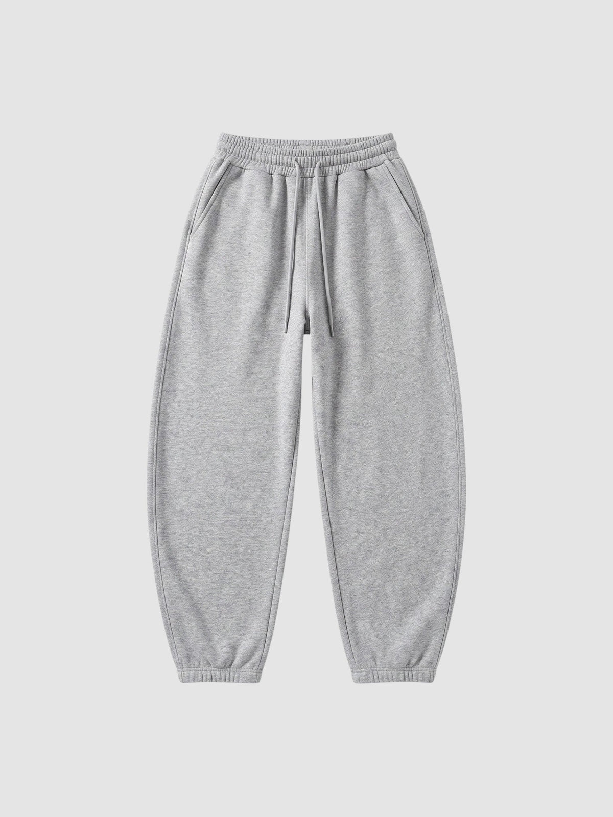 Y2K Avenue grey barrel leg sweatpants with a high elastic waist, drawstring, and deep side pockets.