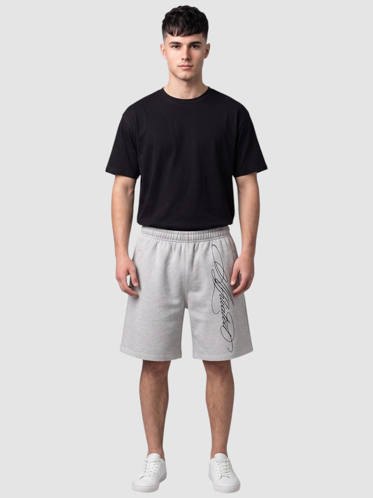 Y2K Avenue grey fleece shorts with black cursive calligraphy print, featuring an elastic waist and relaxed fit.
