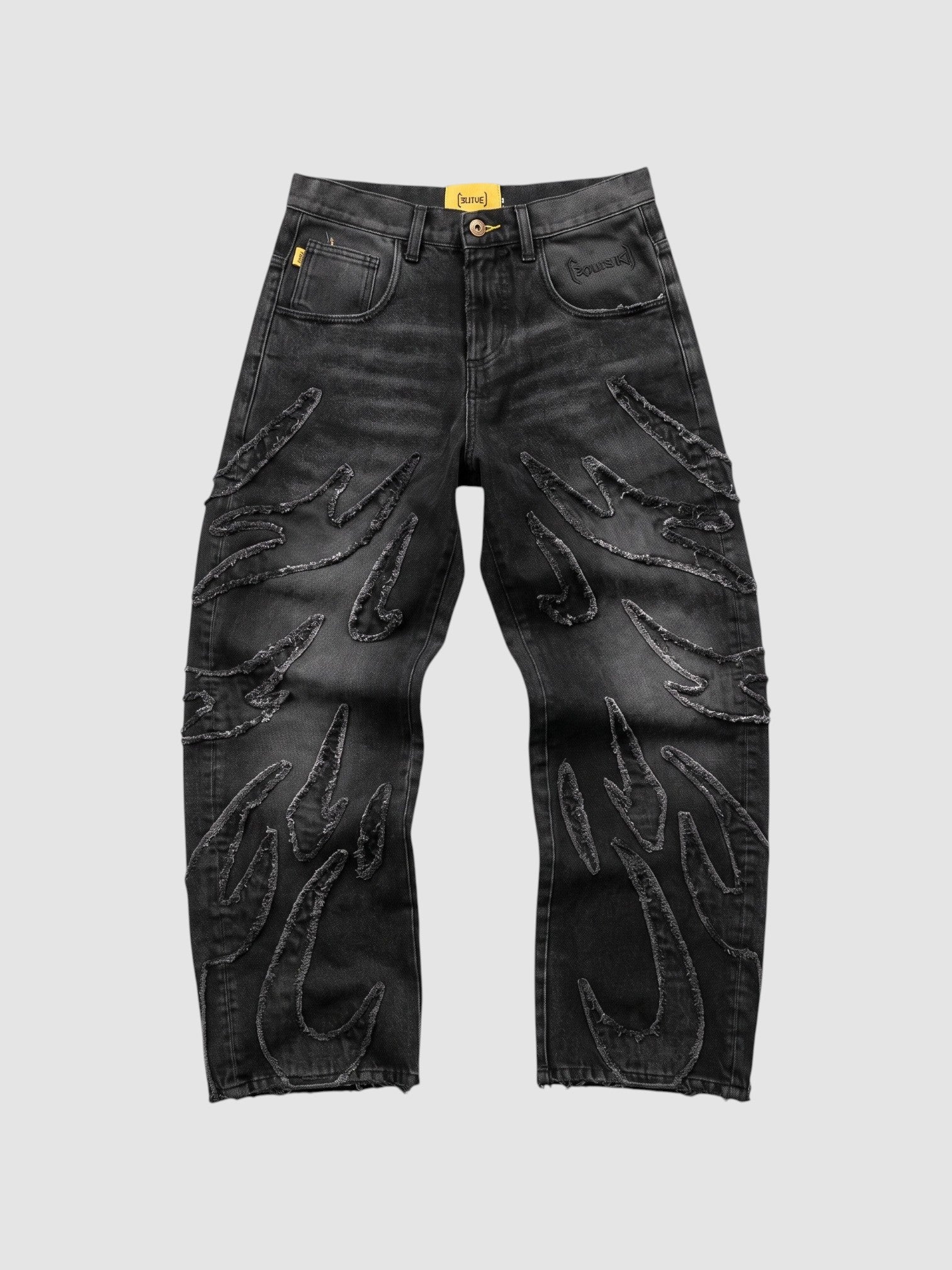 Y2K Avenue baggy grey denim jeans featuring raw-edge flame appliqués and a wide-leg fit.