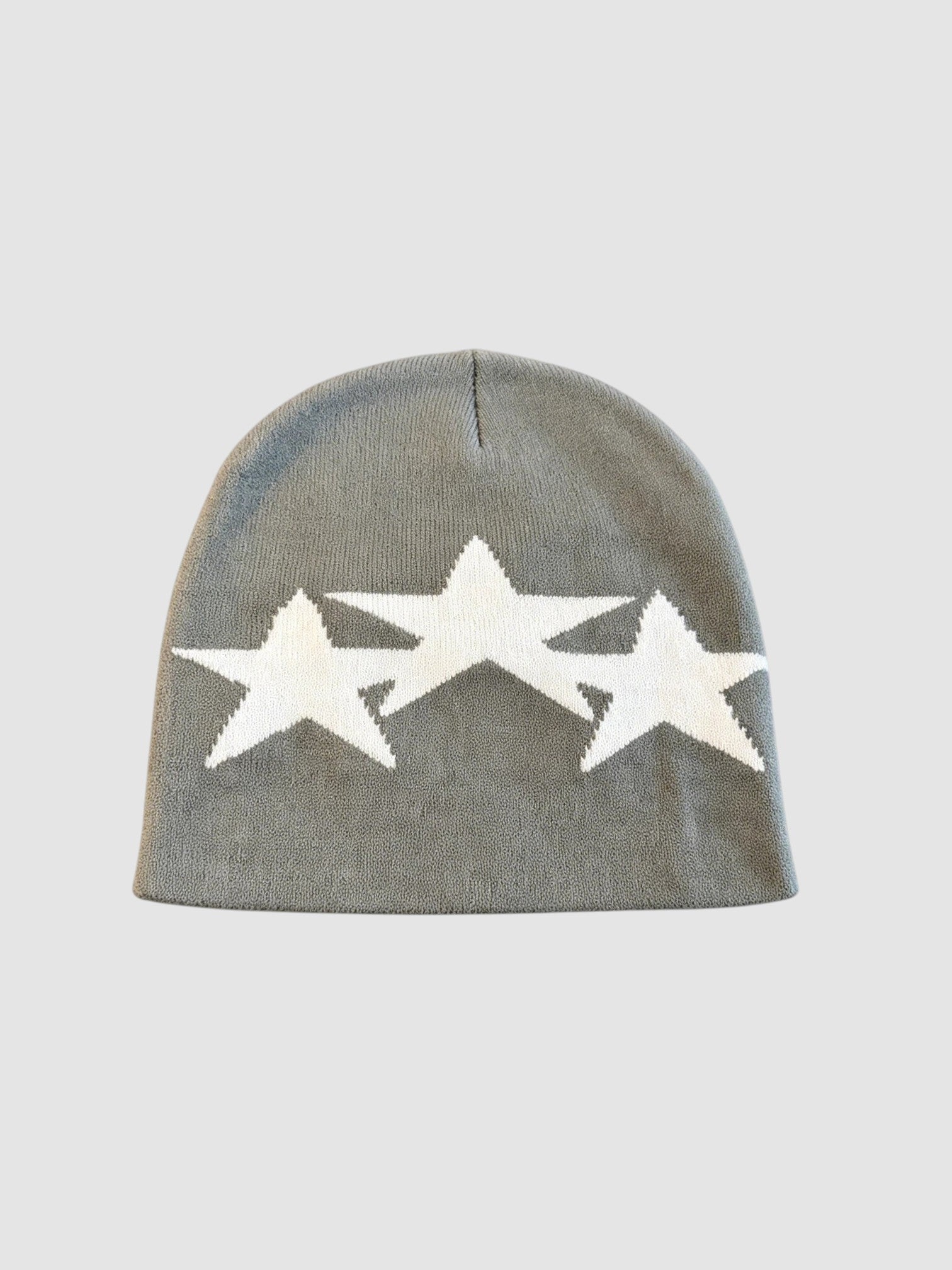 Y2K Avenue grey beanie featuring three white overlapping star patterns in a lightweight acrylic knit design.