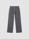 Y2K AVENUE grey washed denim cargo pants for women featuring tonal star prints, large thigh pockets, and low-rise fit.