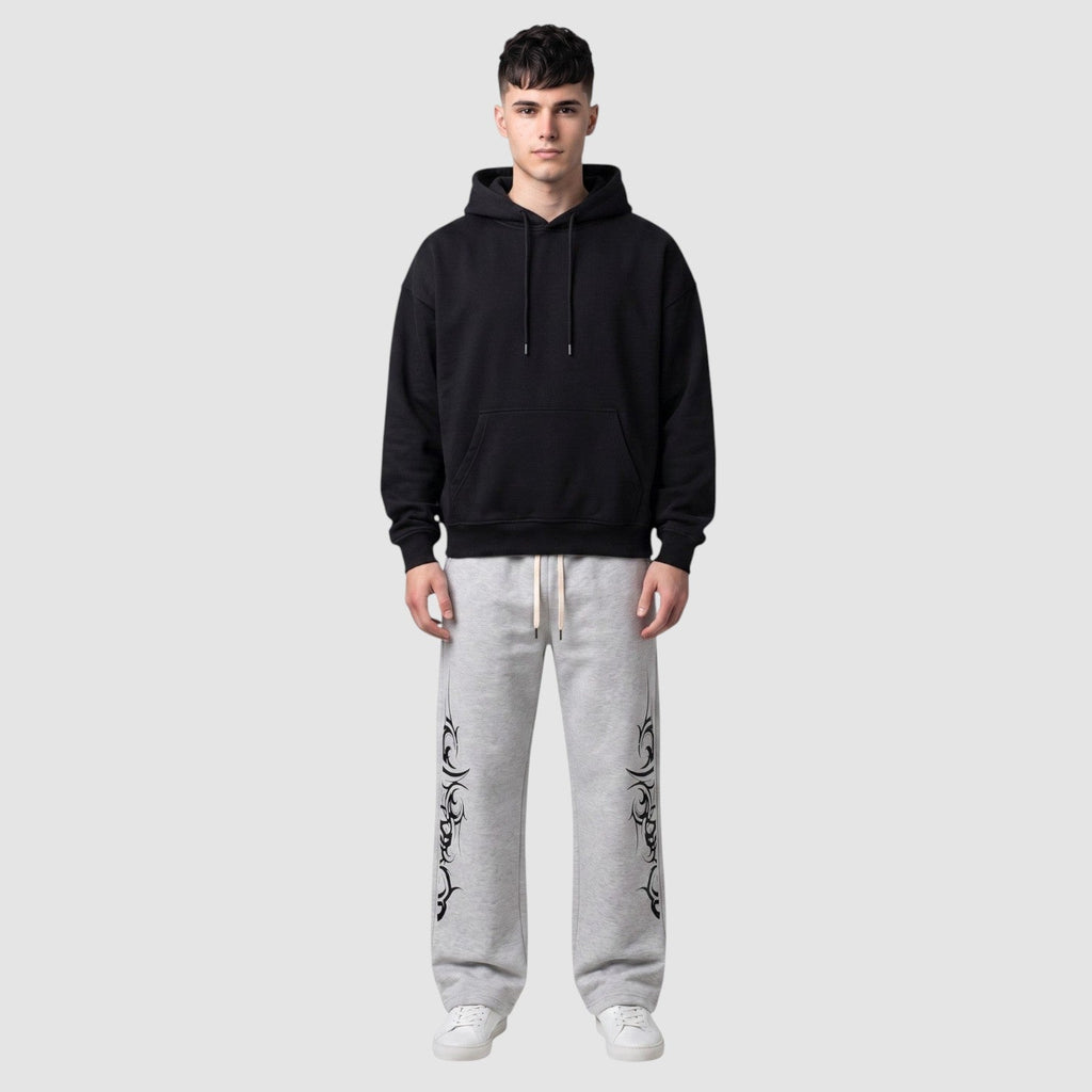 Y2K Avenue grey heather fleece joggers with black tribal graphic print, wide leg fit, and adjustable drawstring waist