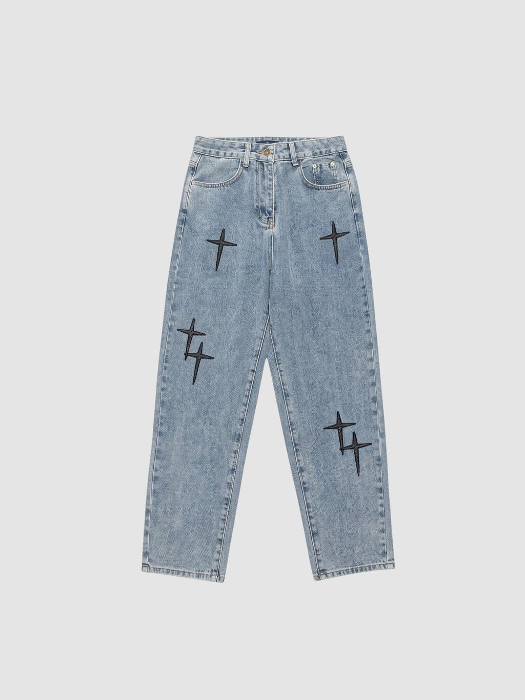 Y2K Avenue light wash denim jeans for men featuring black embroidered cross patterns and a relaxed straight fit.