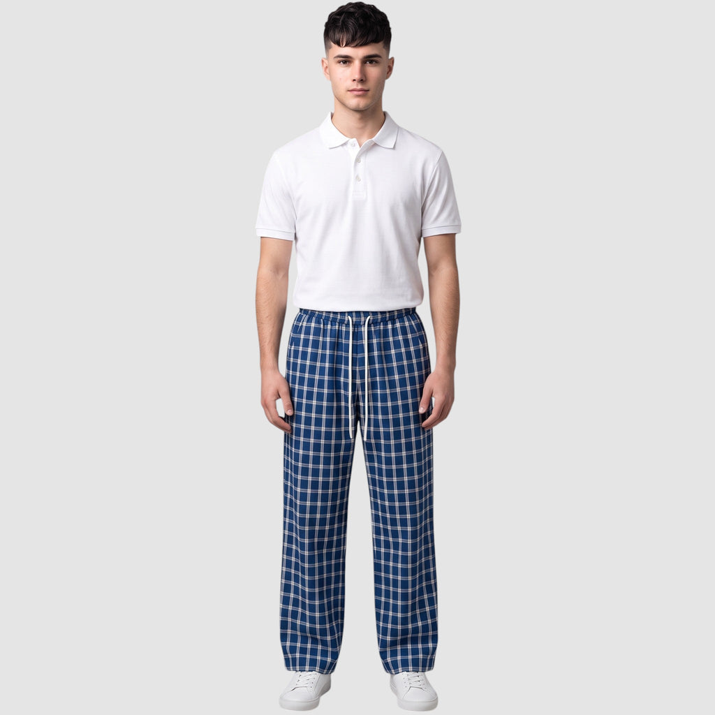 Y2K Avenue wide-leg plaid trousers in navy and white with an elastic drawstring waist worn by a male model