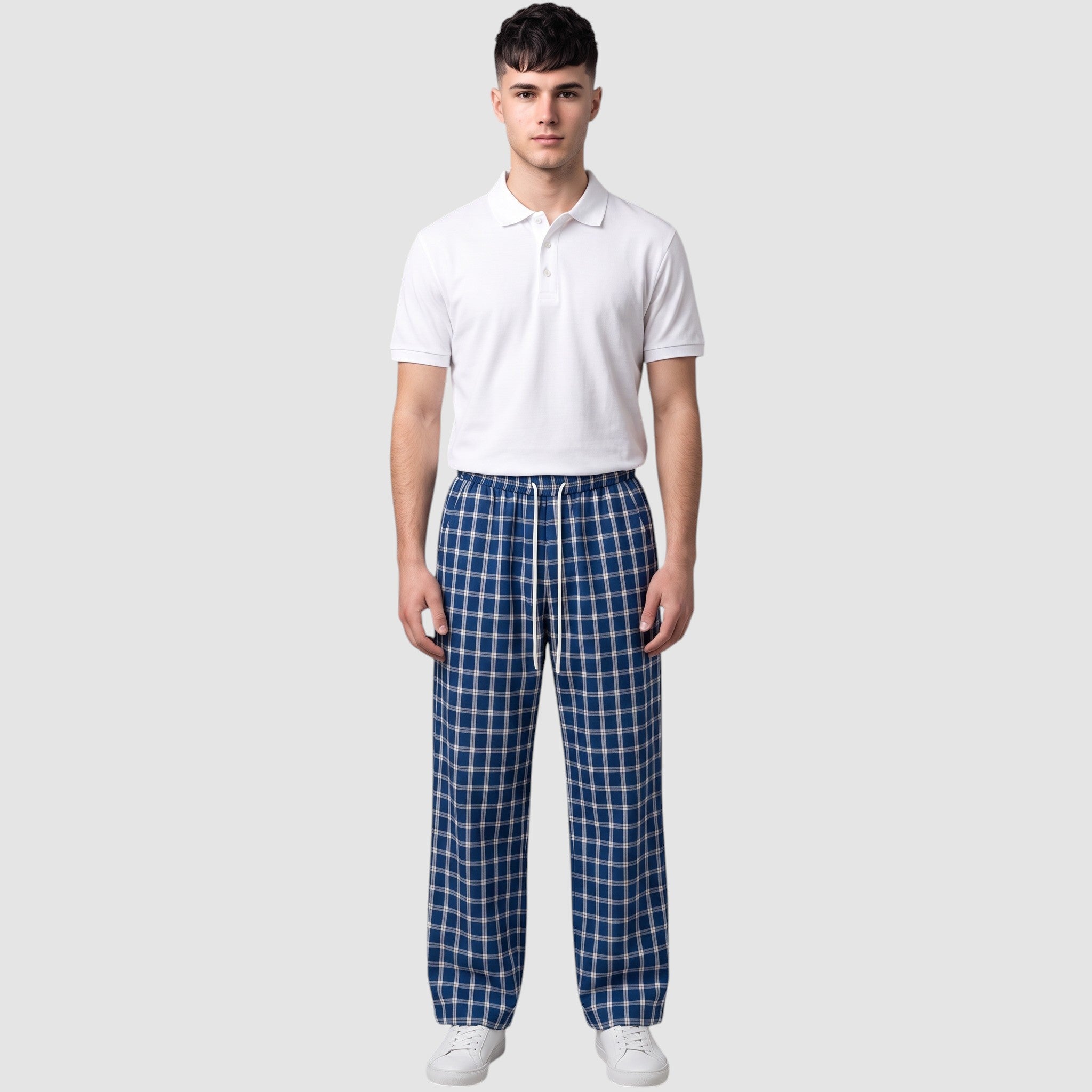 Y2K Avenue wide-leg plaid trousers in navy and white with an elastic drawstring waist worn by a male model