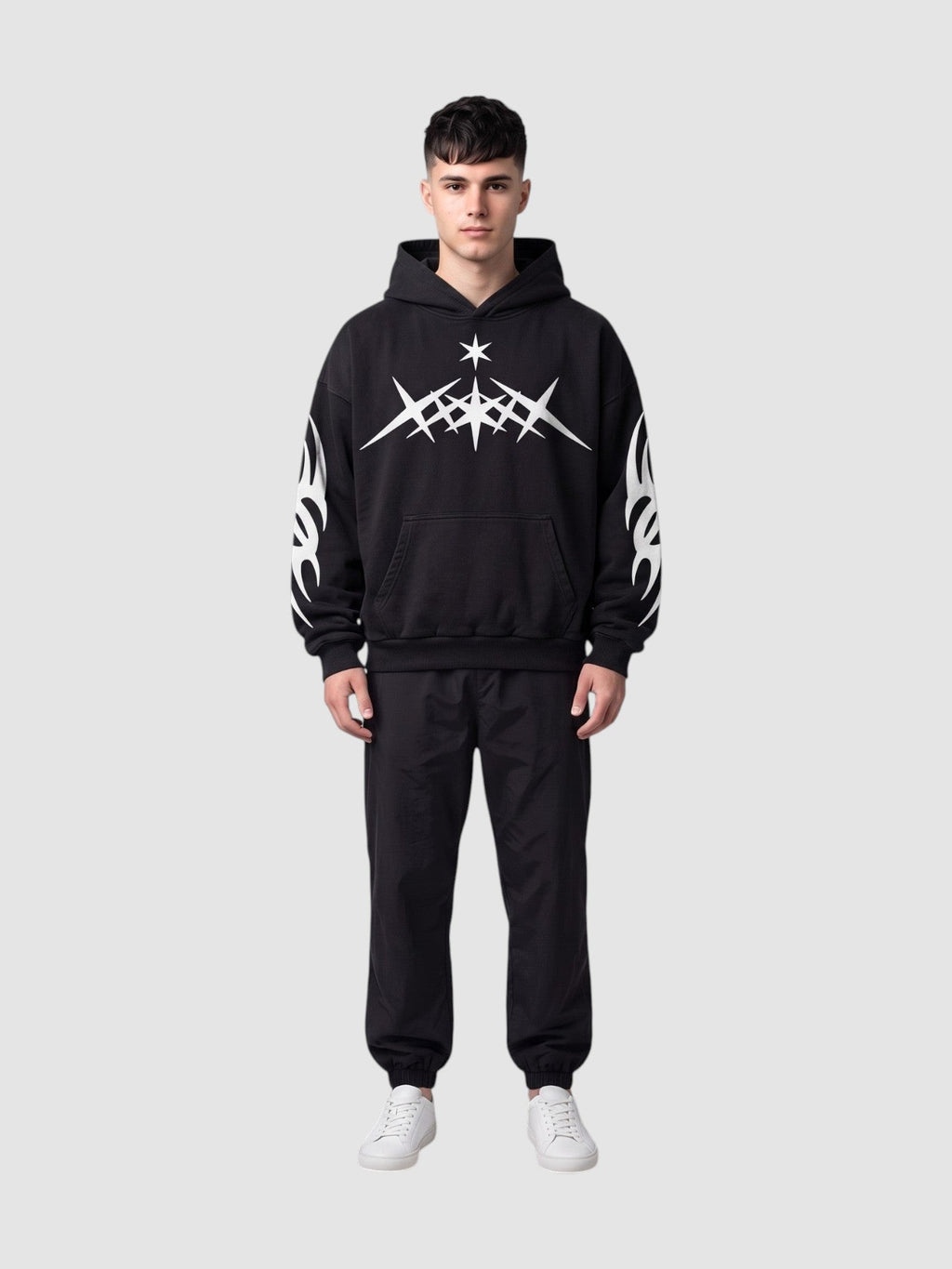 Y2K Avenue oversized black washed hoodie with white flame and star graphics, featuring a kangaroo pocket and hood.
