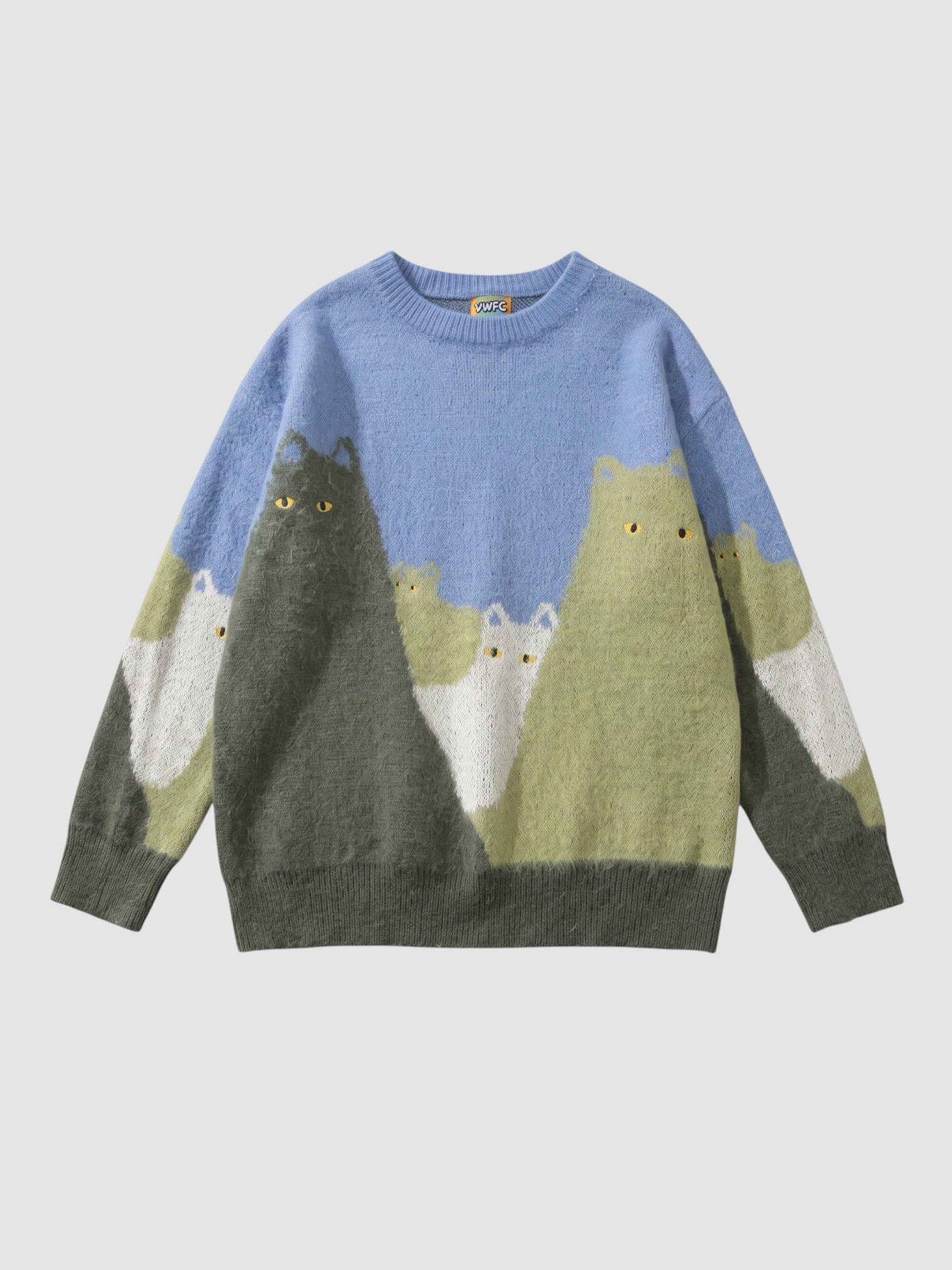 Y2K AVENUE oversized knit sweater featuring a blue, green, and grey cat pattern with yellow eyes and a crew neck.