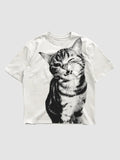 Y2K Avenue white oversized t-shirt featuring a black halftone cat portrait print with a ribbed crew neck