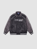 Y2K Avenue oversized motorcycle jacket in black and charcoal with white piping, graphic print, and ribbed cuffs.