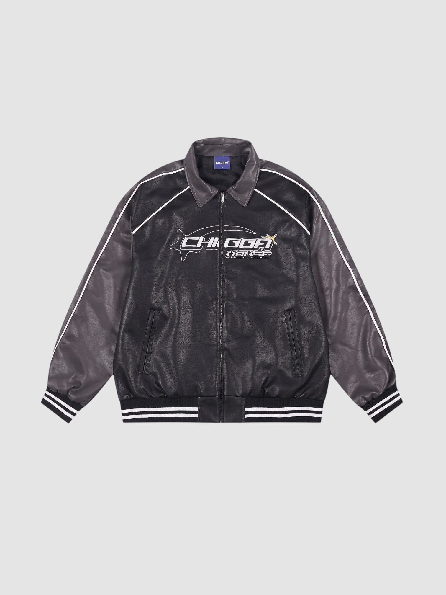 Y2K Avenue oversized motorcycle jacket in black and charcoal with white piping, graphic print, and ribbed cuffs.