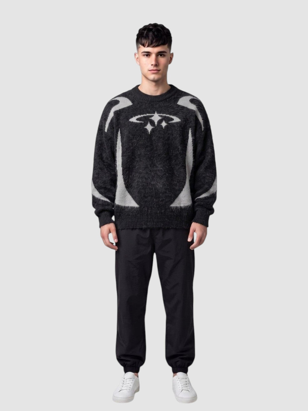Y2K Avenue oversized anthracite knit sweater with light grey star embroidery and curved patterns on a male model
