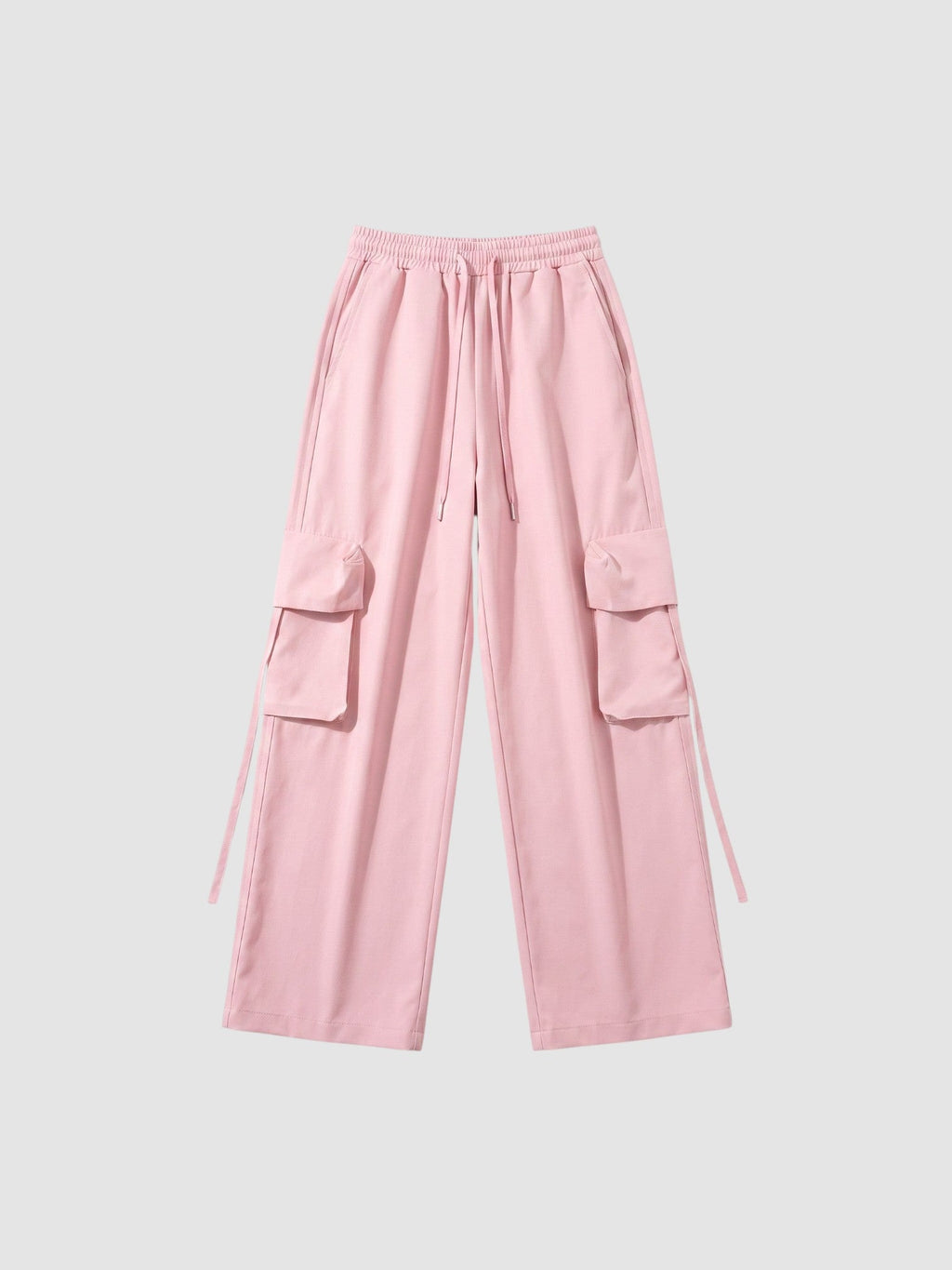 Y2K Avenue powder pink parachute cargo pants with wide legs, elastic waist, drawstring, and side flap pockets.