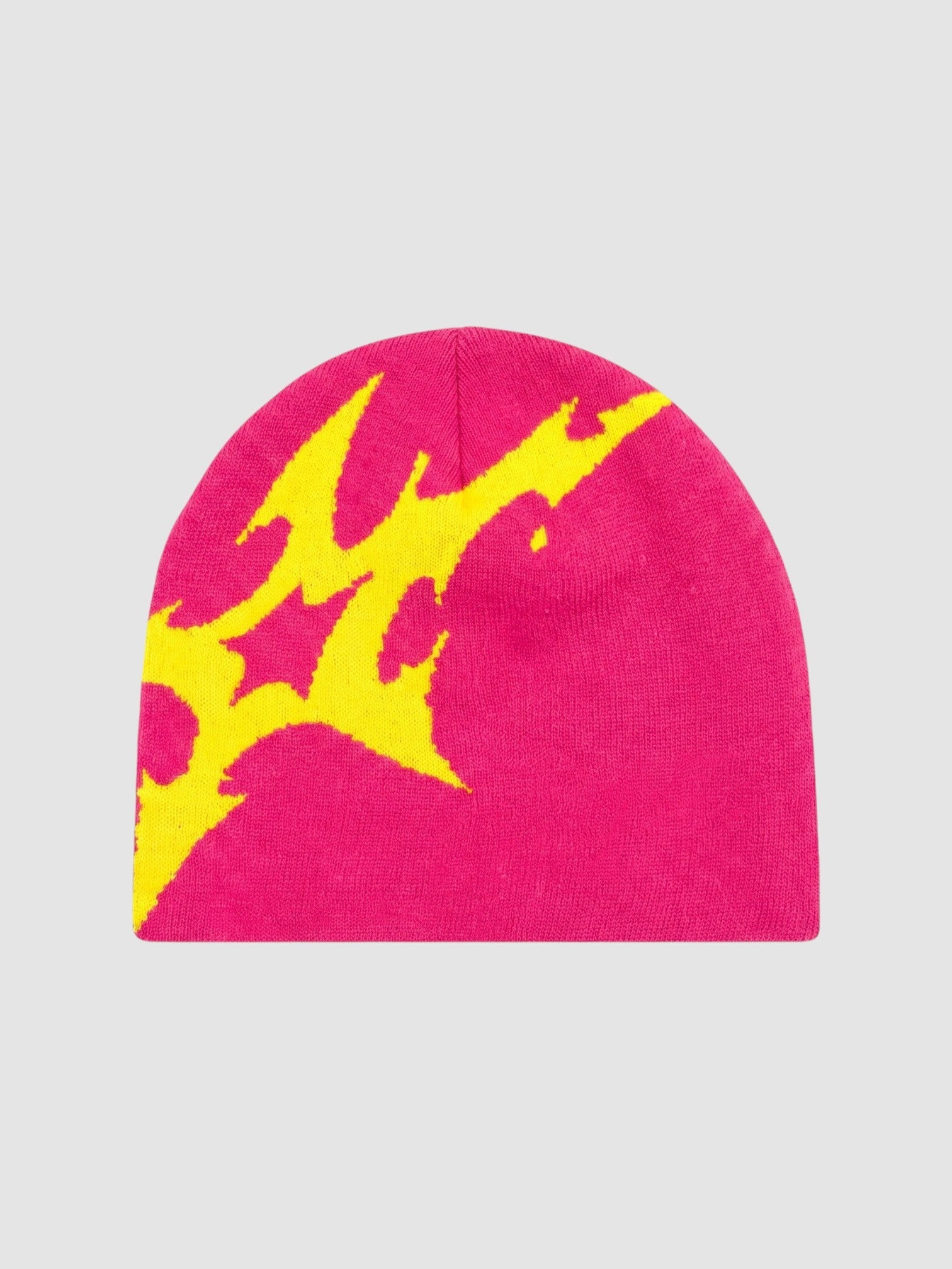 Y2K Avenue beanie in bright pink acrylic knit featuring an asymmetrical yellow lightning bolt graphic design.
