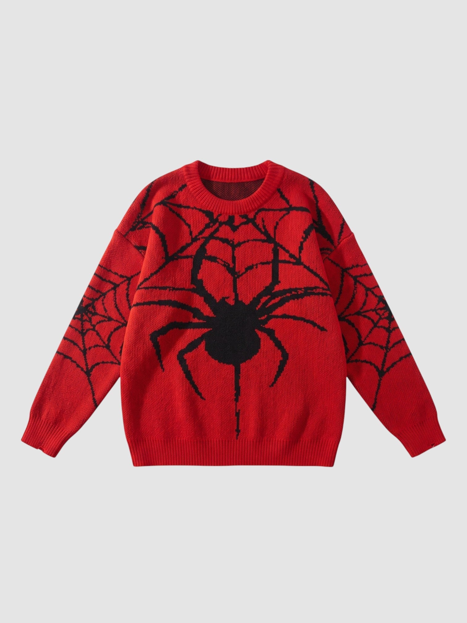 Y2K AVENUE red oversized knit sweater featuring a large black embroidered spider web design on the front and sleeves.
