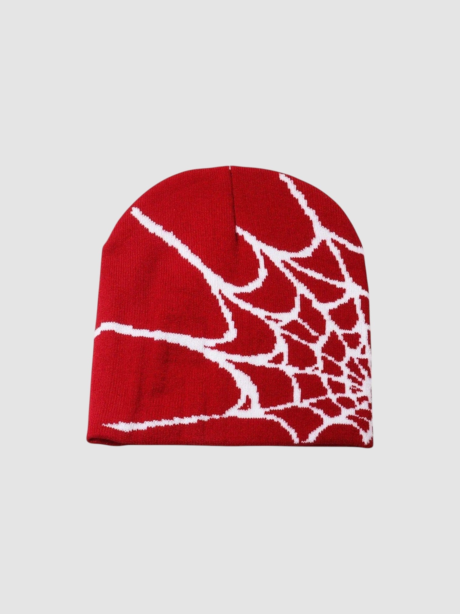 Y2K Avenue red knit beanie featuring a white spider web pattern with a radiating design.