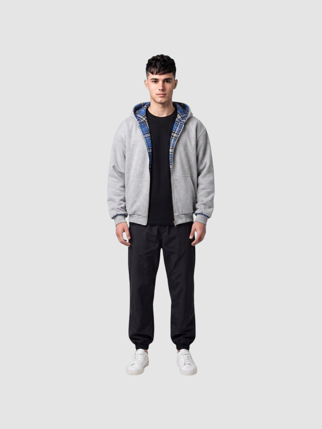 Y2K AVENUE reversible grey cotton zip-up hoodie with blue and black tartan lining worn by a male model
